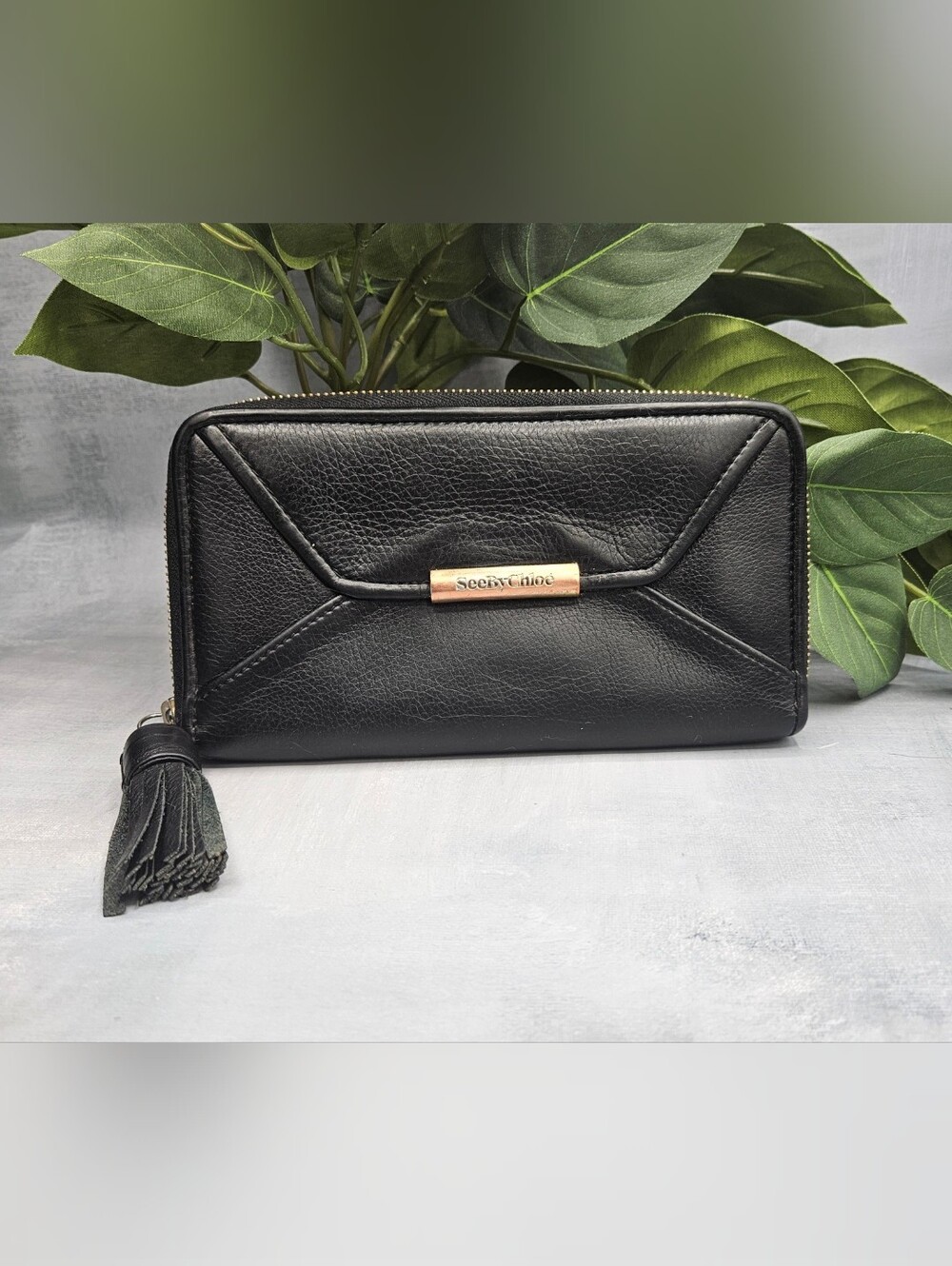 See By Chloé black Long Ziparound Leather Wallet. Crafted from supple black pebb